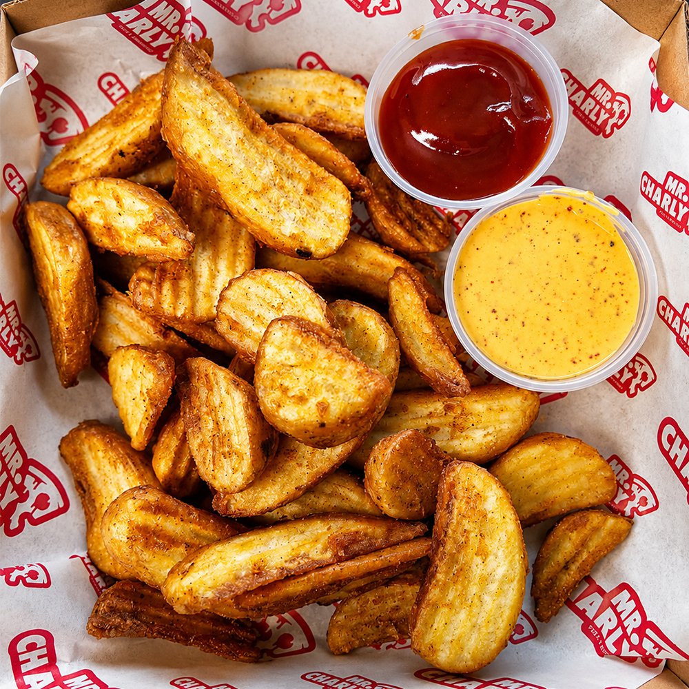 Papas gajo con aderezos de Mr. Charly Pizza